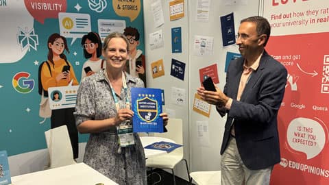 International Relations Manager, Lucy Dixon, receives an award certificate from EDUOpinions.